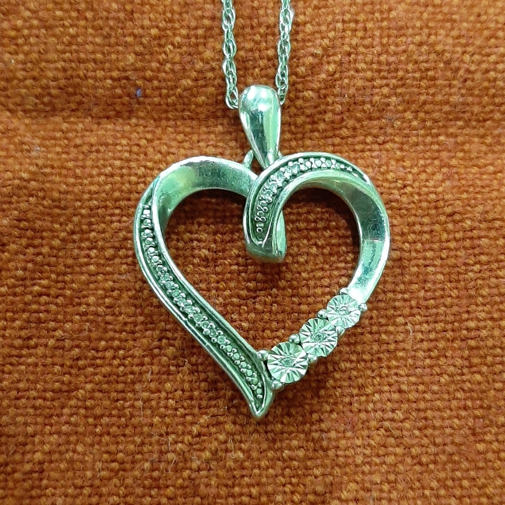 Sterling silver with diamond chip heart pendant